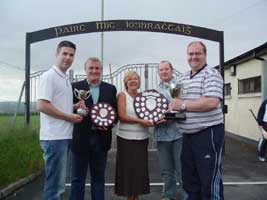 Pictures are of Stephen Corr Falls Community Council, Micky French Gort na Móna GAA, Terry and Mary Enright and Pat Wallace.