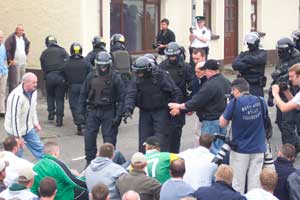 PSNI manhandle nationalist protestors in Dunloy (above)