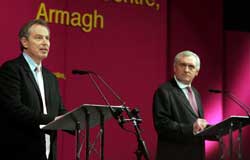 British Prime Minister Tony Blair and Taoiseach Bertie Ahern speaking during a press conference in the Navan Centre, in Armagh