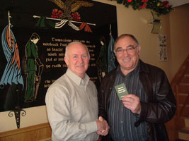 Liam Shannon presents Ronnie Kasrils with his Honorary membership of the Felons Association on Tuesday 5 December