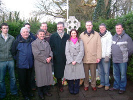 Gerry Adams, members of the Harvey Family and local Sinn Féin elected representatives pictured at the memorial dedicated to Volunteer Seamus Harvey