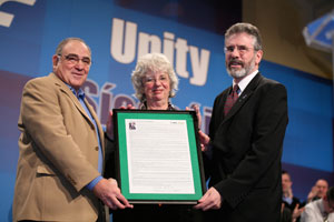 Ronnie and Eleanor Kasrills present Gerry Adams with a framed and signed letter of support from South African President Thabo Mbeki