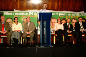 Gerry Adams told the packed Dublin meeting that Sinn Féin should be judged on the changes it brings about