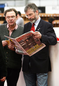 Tom Hartley and Gerry Adams keep informed with a copy of An Phoblacht