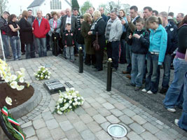 People gather round to admire the new monument