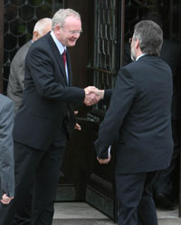 Martin McGuinness and Gerry Adams arrive at Stormont