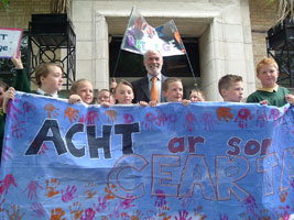 Francie Brolly with kids from Gaelscoil na Mona protesting at the BBC in Belfast on Tuesday, 5 June, over the state-run broadcaster’s lack of coverage of Irish language issues