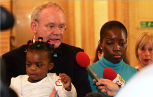 Martin McGuinness with Lordorice Djountsu and her daughter Imelda