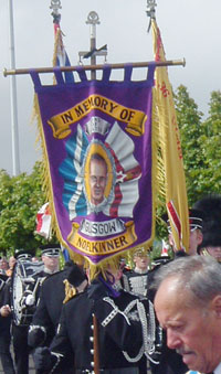 The banner honouring UVF gunman Noel Kinner carried by members of the Scottish Sons of Ulster Flute Band at the Orange Order’s Whiterock parade