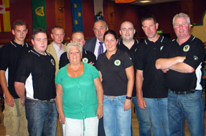 Members of the Colm Mark’s Cumann pictured with Colm’s mother Roisin, ex POW Marcas Mac Ruairí and local Sinn Féin Councillor Frank McDowell