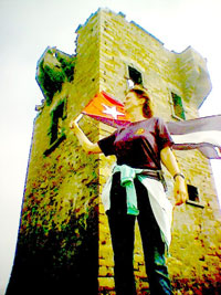 Eleanor Lanigan of Free The Miami Five Campaign flies the flag at Glen Head during the annual Camp Havana 2007 gathering at Gleann Cholm Cille, Donegal