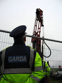 A protester climbed up on the drilling machine, forcing the Shell workers to shut it off