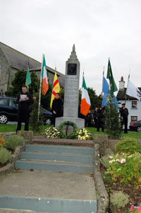 Wicklow councillor John Brady addresses the Kevin Barry commemoration in village of Rathvilly in County Carlow. Also pictured, standing next to monument, is Carlow/Kilkenny Sinn Féin representative Kathleen Funchion