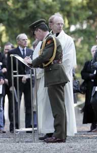 Bertie Ahern’s aide-de-camp at the funeral of Katy French