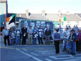 Councillor Dermot Connolly introducing Séanna Walsh (to his right) at the Bobby Sands memorial in Ballinasloe, Bank Holiday Monday