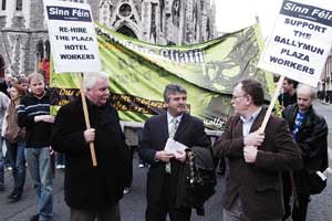 Sinn Féin Councillors Larry O’Toole and Dessie Ellis with Arthur Morgan TD (centre) show solidarity with the Plaza workers