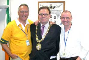 COMRADES: Tom with Belfast republicans Séanna Walsh and Jim Gibney after his election