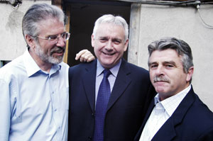 SUPPORT: Sinn Féin President Gerry Adams and Arthur Morgan TD with Brendan McFarlane before he appeared in court on Tuesday. His trial opened the following day