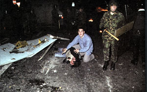 Dermot McShane lies fatally injured after he was crushed by a British army Saxon armoured vehicle in 1996