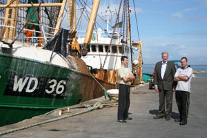 Sinn Féin Councillor Maurice Roche with fishermen Mark Fethersonhaugh (left) and Mark Cullen