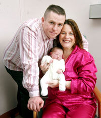 HAPPY FAMILY: Michelle with husband Jimmy and baby Aoise