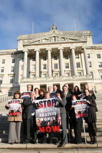 Annie Campbell of Women's Aid and Bernie Reilly of the Falls Women's Centre join Sinn Féin MLAs at Stormont calling for and end to violence against women