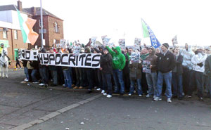 STANDING TOGETHER: Fans send a message to the board