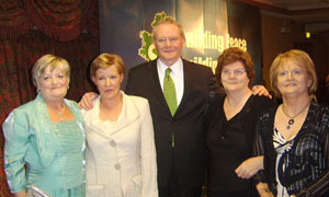 Kathleen McAleer (wife of Barney McAleer); Ann Quinn (wife of Cathal Quinn); Margaret McMahon (wife of Patsy McMahon) and Patricia McAnespie (wife of Mickey McAnespie) pictured with Martin McGuinness