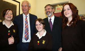 St Louise’s pupils Laura Whinney, Sally Smyth and Nuala Lunney with Sinn Féin president Gerry Adams and veteran broadcaster Jon Snow