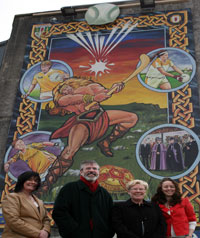 ANNIVERSARY: Sinn Féin President Gerry Adams with Jennifer McCann MLA and Councillors Máire Cush and Charlene O'Hara at the unveiling of a mural at Casement Park commemorating 125 years of the GAA in Antrim