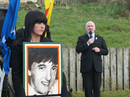 Geraldine Casey holds a portrait of her father