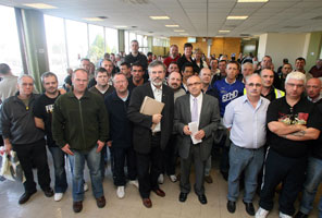 UNITED WE STAND: Sinn Féin’s Gerry Adams MP and Paul Butler MLA with Visteon workers at the Belfast car plant