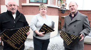 ATTACK: We will not allow anyone to deface the proud memory of our patriot dead.  Sean Lennon, Sue Ramsey and Paul Maskey with the plaque destroyed by thugs