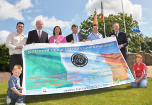 FIRST FOR TYRONE: Some members of the Commemoration committee pictured with the three MPs for Tyrone, Martin McGuinness, Michelle Gildernew and Pat Doherty