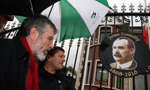 Gerry Adams and new Sinn Féin councillor, Caoimhín Mac Giolla Mhín at the unveiling