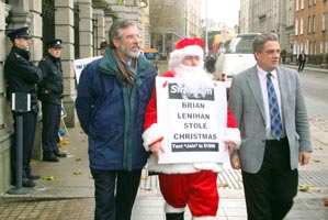 Santa Claus joined Gerry Adams and Aengus Ó Snodaigh to launch the campaign to have Christmas Social  Welfare payment restored