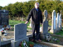 Councillor Noel Harrington, the first Sinn Féin councillor representing Kinsale, County Cork, for 90 years, is pictured laying a wreath at The Abbey Cemetery in Kinsale