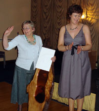 Pauline McCauley makes a presentation to Margaret Greenan