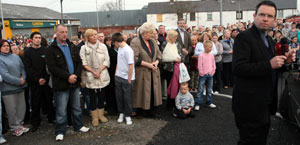 Gerry Adams joins Lenadoon residents to express their shock and anger at the killing of Seamus Fox