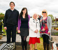 COUNCILLOR Cathy McCafferty with Anne Hehir and two of her children, Hugh and Fiona on Sunday at a commemoration for Volunteer Hugh Hehir who died on active service on 6th May 1988. A native of Clarecastle, Hugh left behind a young family, his wife Ann an