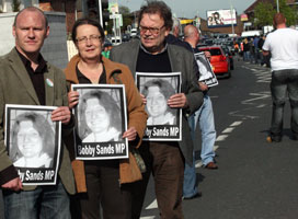 Sinn Féin’s Paul Maskey, Bairbre de Brún and Tom Hartley joined with dozens of people who formed a picket at the junction of the Falls and the Whiterock Roads