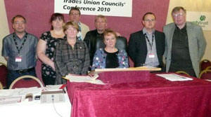 The relatives pictured with trade union officials at the Annual Conference of Trades Union Councils