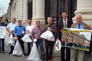 Sinn Féin Senator Pearse Doherty with party councillors and activists delivering thousands of postcards to An Taoiseach demanding action on job creation